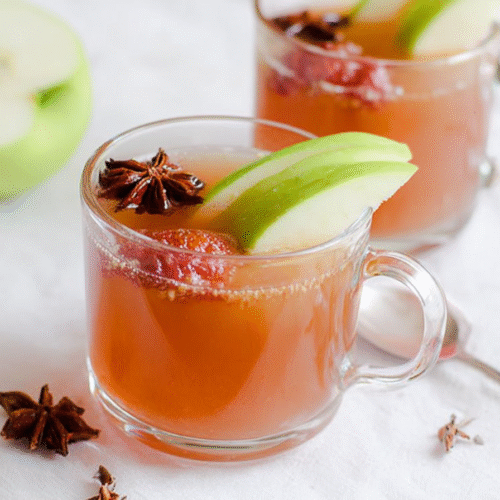 apple peel tea recipe for weight loss served with green apple slices and star anise