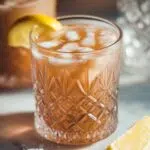 close-up of cream of tartar electrolyte drink in vintage crystal glass